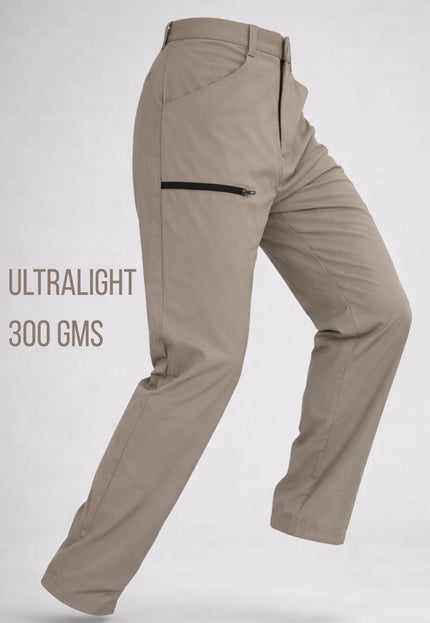 Beige ultralight pants with a visible zipper on a white background